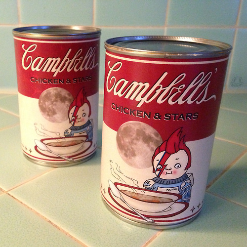 Two Campbell's soup cans with David Bowie